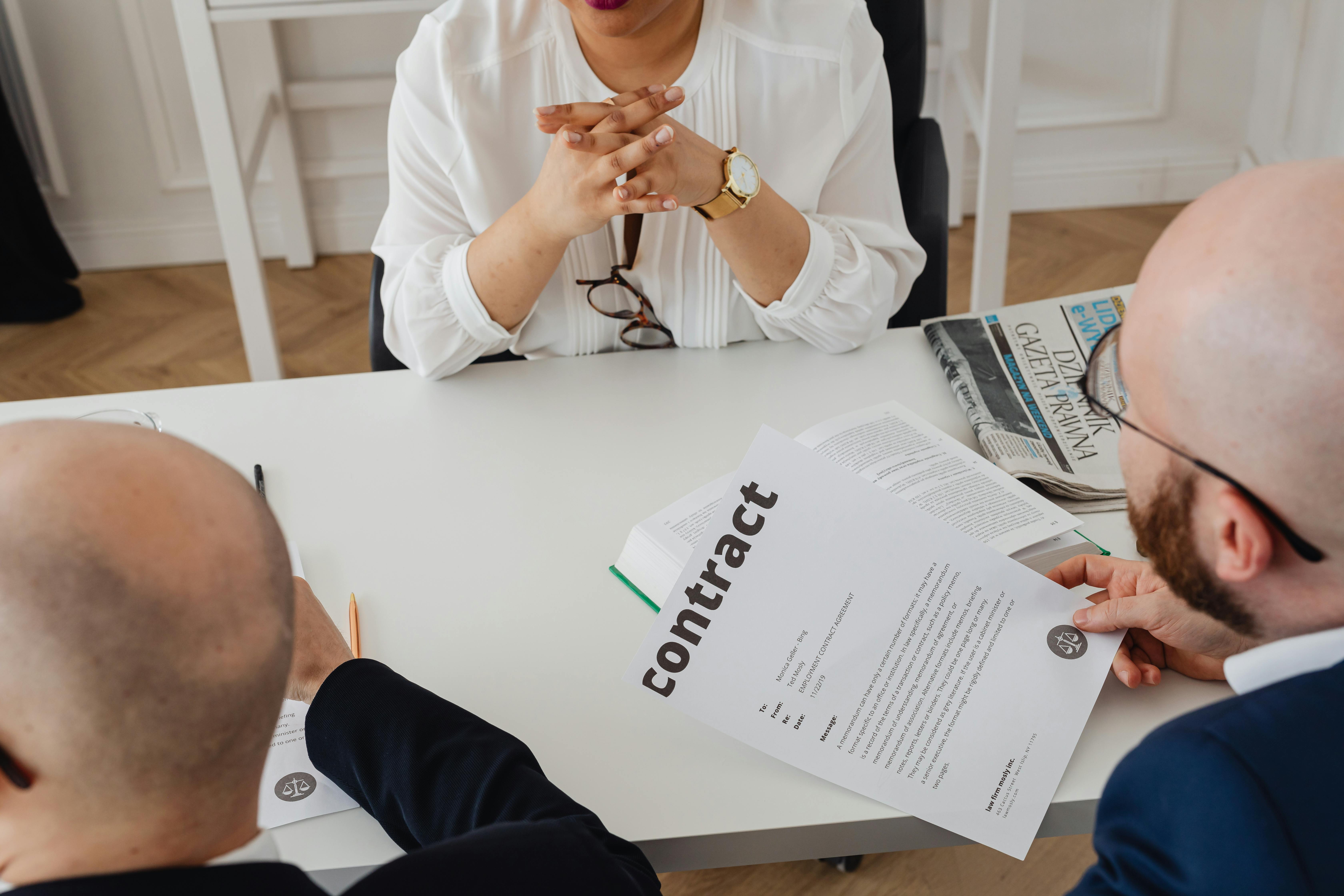 A person writing on a paperAI-generated content may be incorrect.